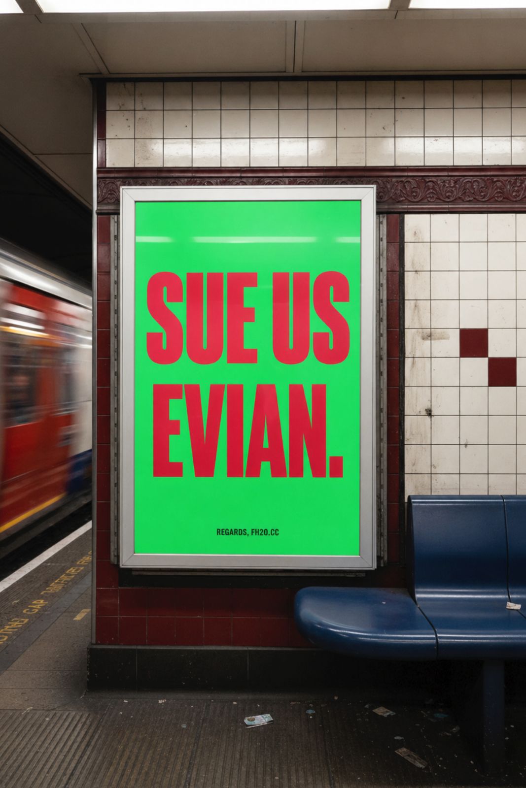 SUE US EVIAN. Regards, FH2O.cc — billboard in a London Underground station.